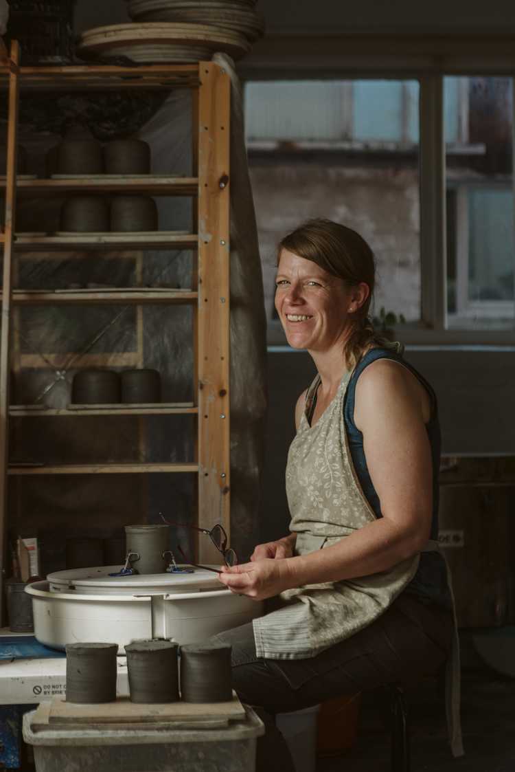 Karen Dawn Curtis sitting pottery wheel Karen Dawn Curtis sitting pottery wheel