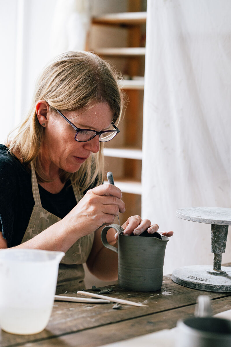 Joining the Handle to Milk Jug