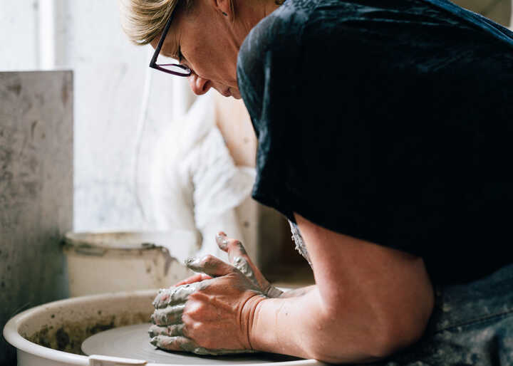 Throwing on potter's wheel