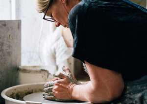 Throwing on potter's wheel