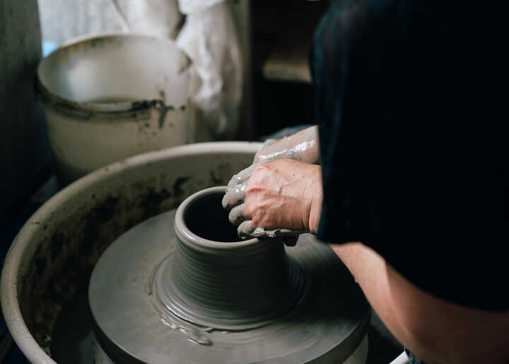 Throwing on potter's wheel