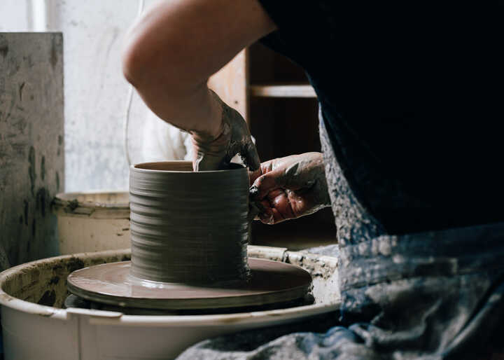 Throwing on potter's wheel