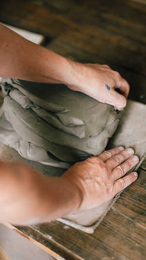 Potter preparing clay Potter preparing clay