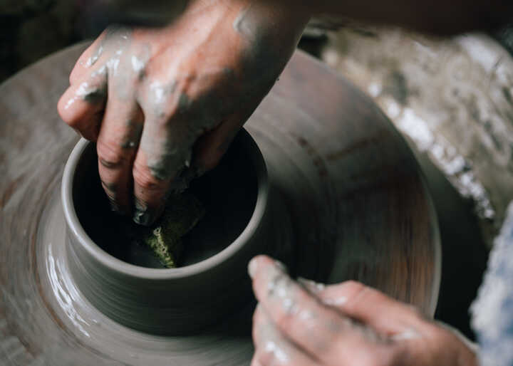 Throwing on potter's wheel
